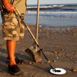 earn extra income beach metal detecting